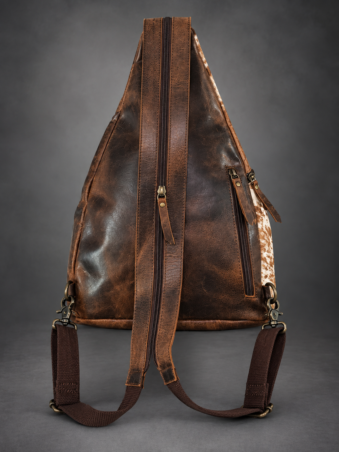 Tooled Leather & Cowhide Sling Backpack
